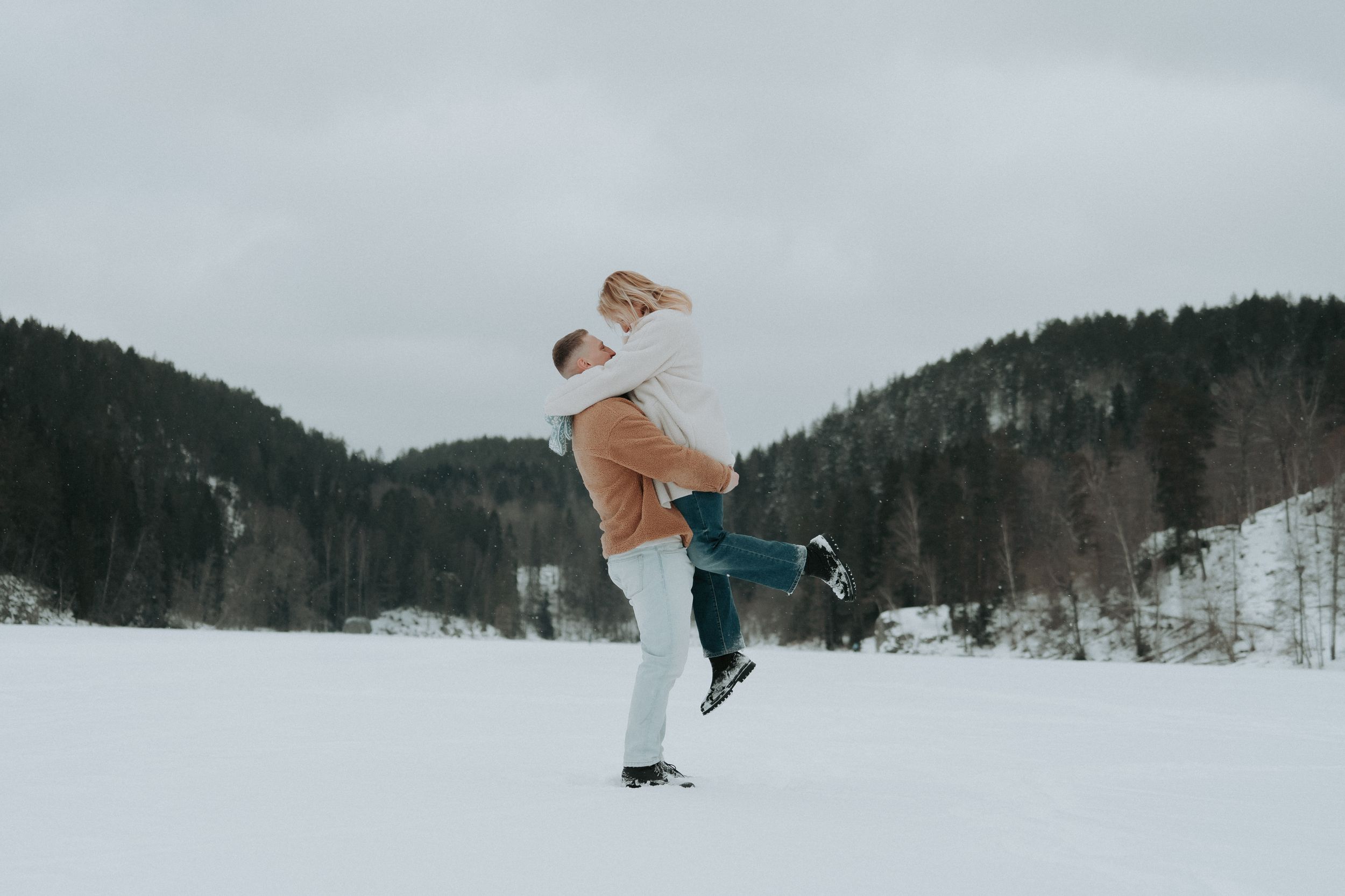 Artistic winter photography sequence showing movement in a snowy mountain setting.