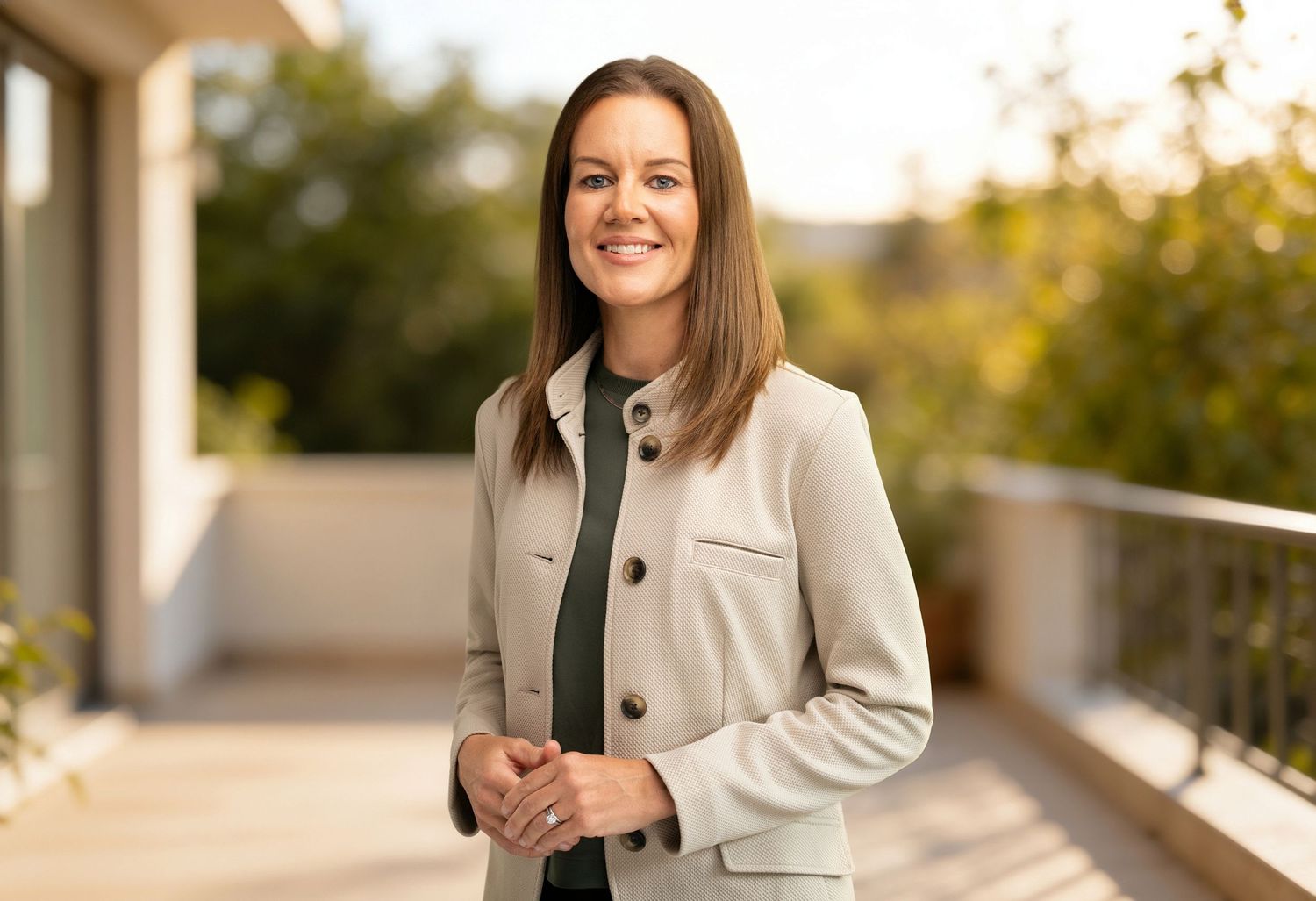 Orlando personal branding photographer Ray Alvarez — lifestyle branding portrait of professional in beige blazer outdoors