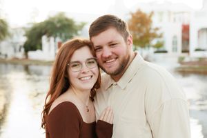 A couple shares intimate moments in a series of romantic outdoor engagement photos during golden hour.