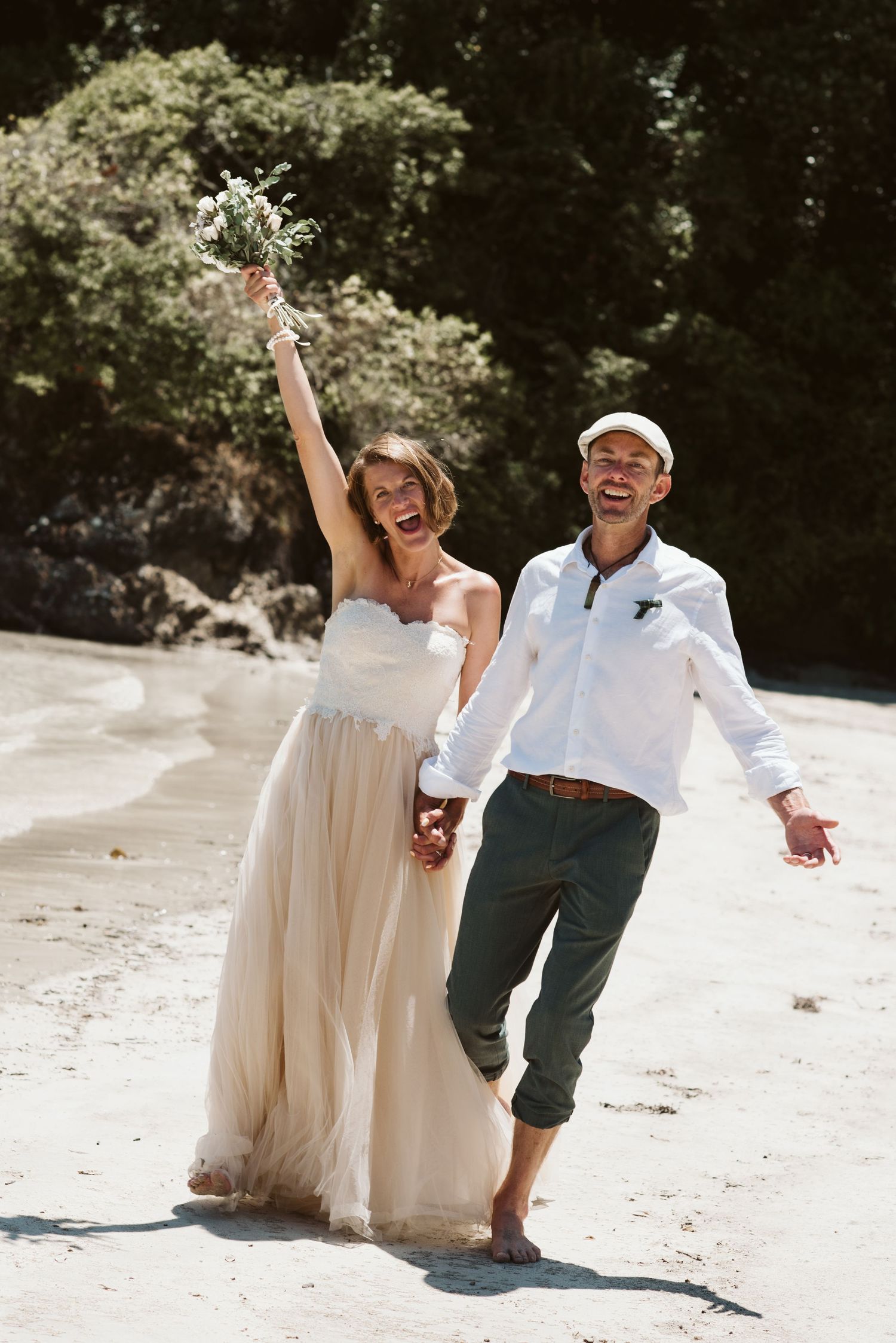 A collage of beach wedding photos showing newlyweds walking along sandy shores with turquoise ocean views.