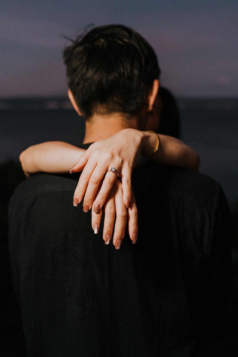 Romantic Bali photoshoot services for engagement moments at Maya Sanur.