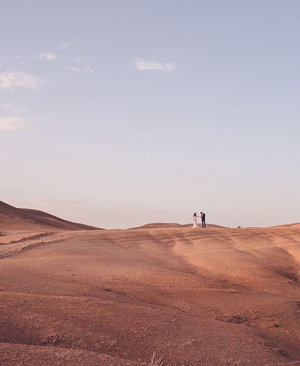 Destination wedding couple portrait in a dramatic landscape