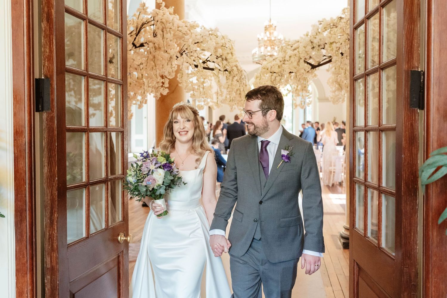 Clearwell Castle wedding venue Gloucestershire castle just married couple leaving room