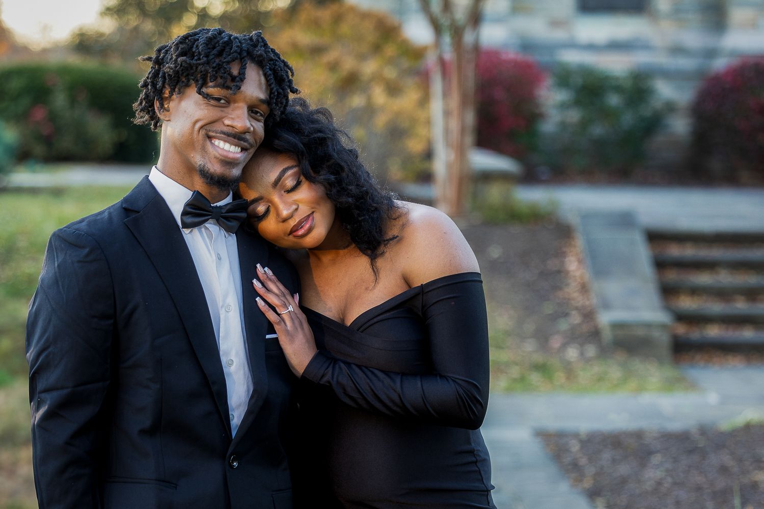 Frederick Maryland Wedding Photographer   - Stylish couple in formal wear share tender moment during outdoor photo session.