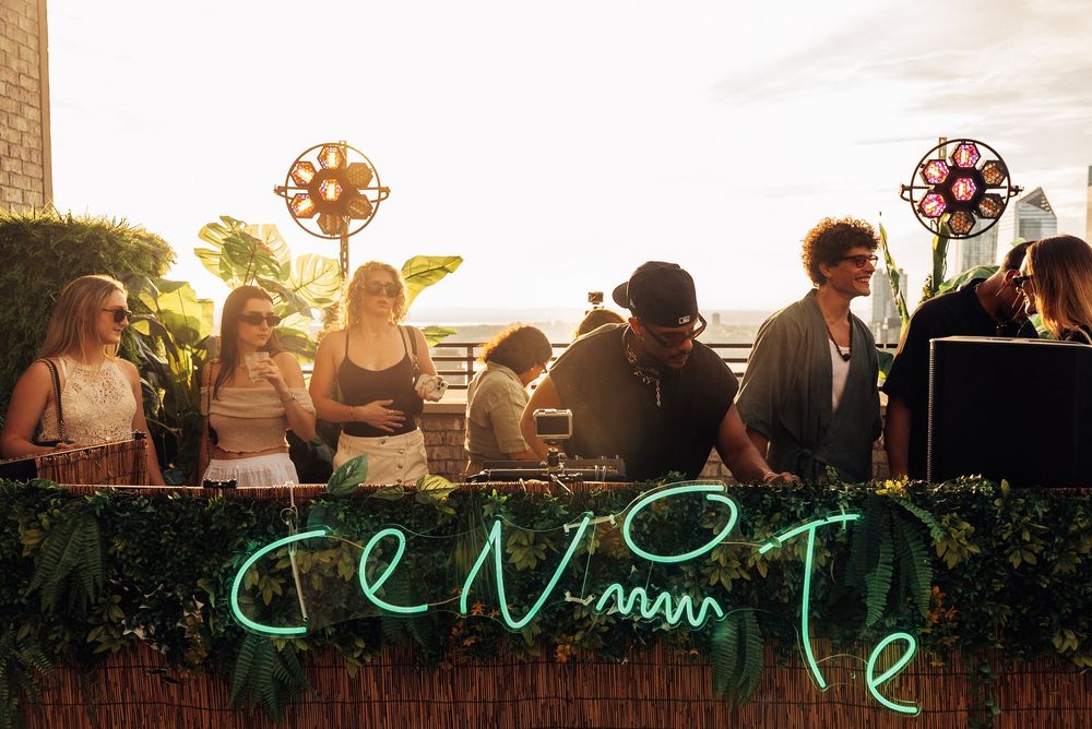 A series of outdoor festival scenes at sunset showing crowds enjoying live music and neon signs glowing in the evening light.