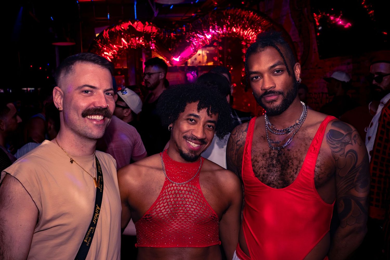 Three friends pose for a photo at a Very That event hosted by Dusty Carpenter at DS Tequila