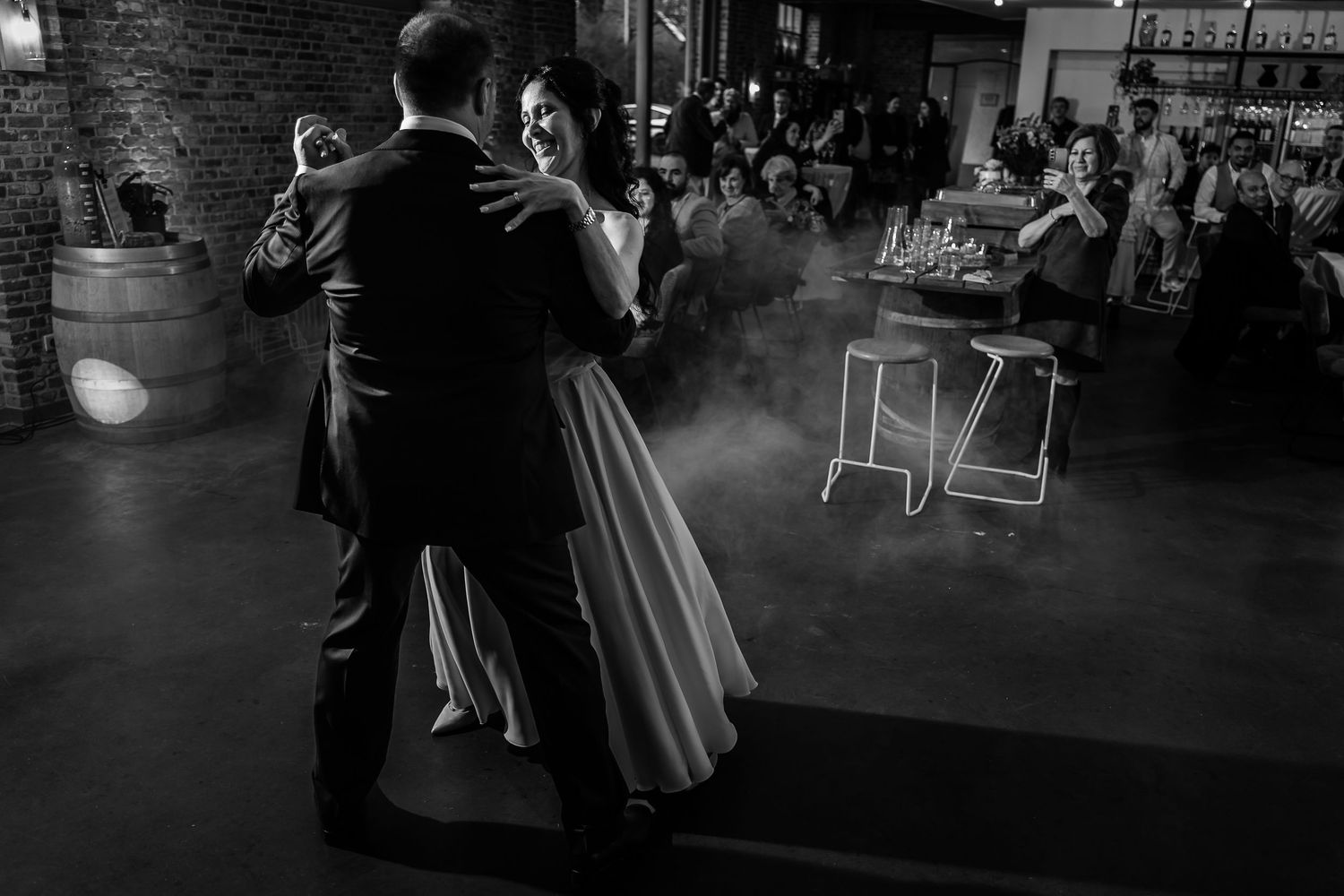 Black and white photos show couples dancing together at what appears to be a social dance event.
