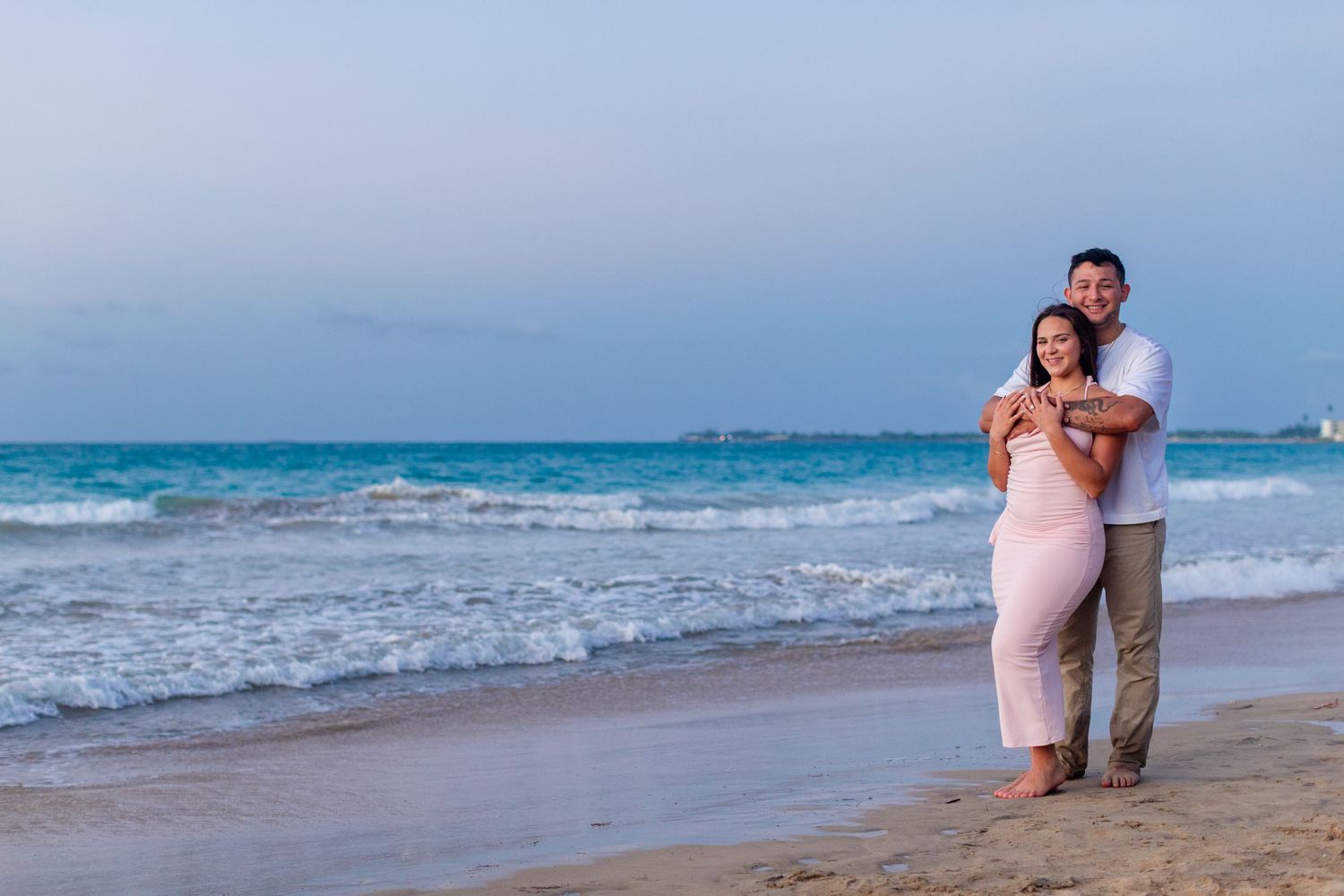 Couples portrait at the beach in Isla Verde, Carolina, Puerto Rico.