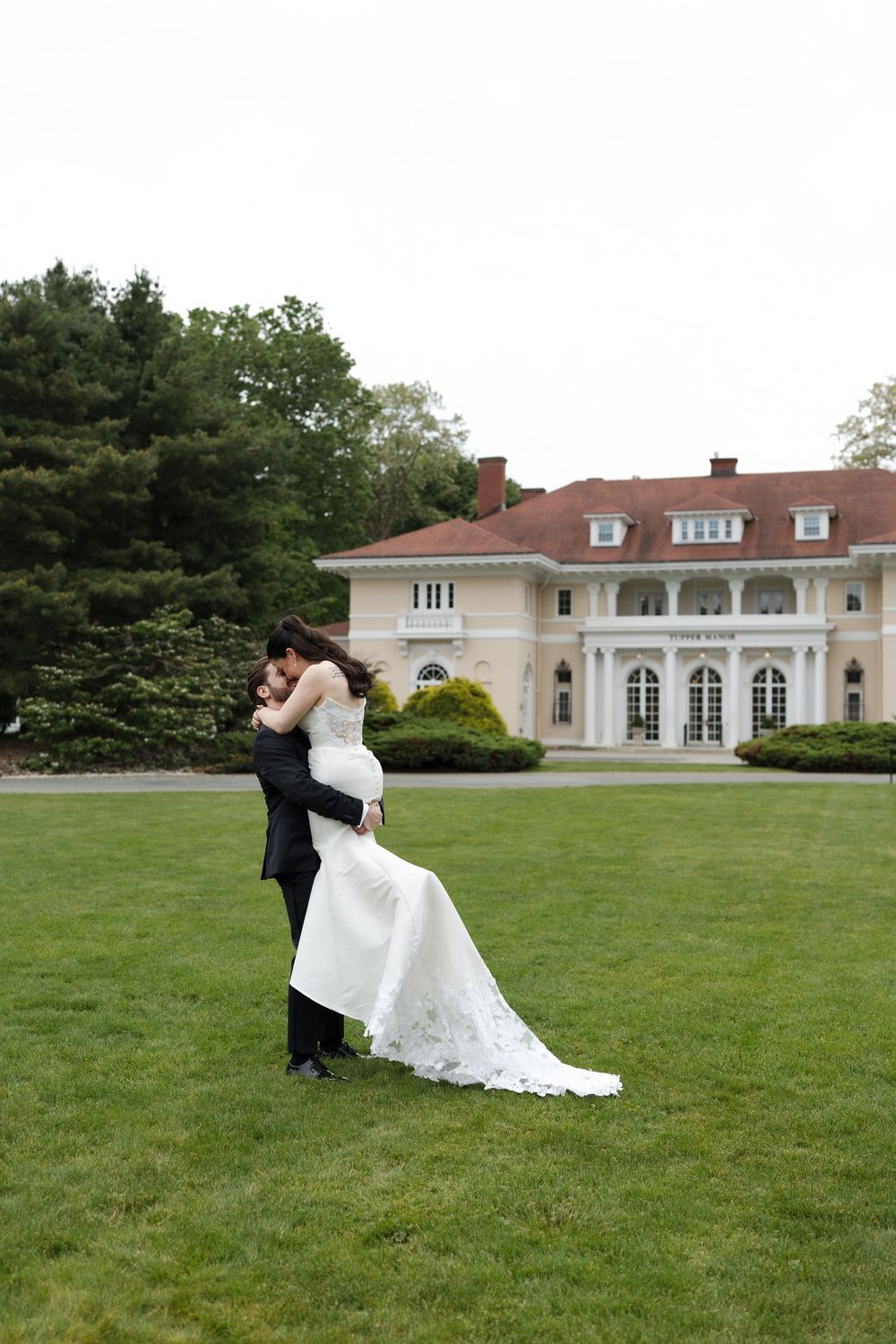 bride and groom at tupper manor mansion in beverly massachusetts