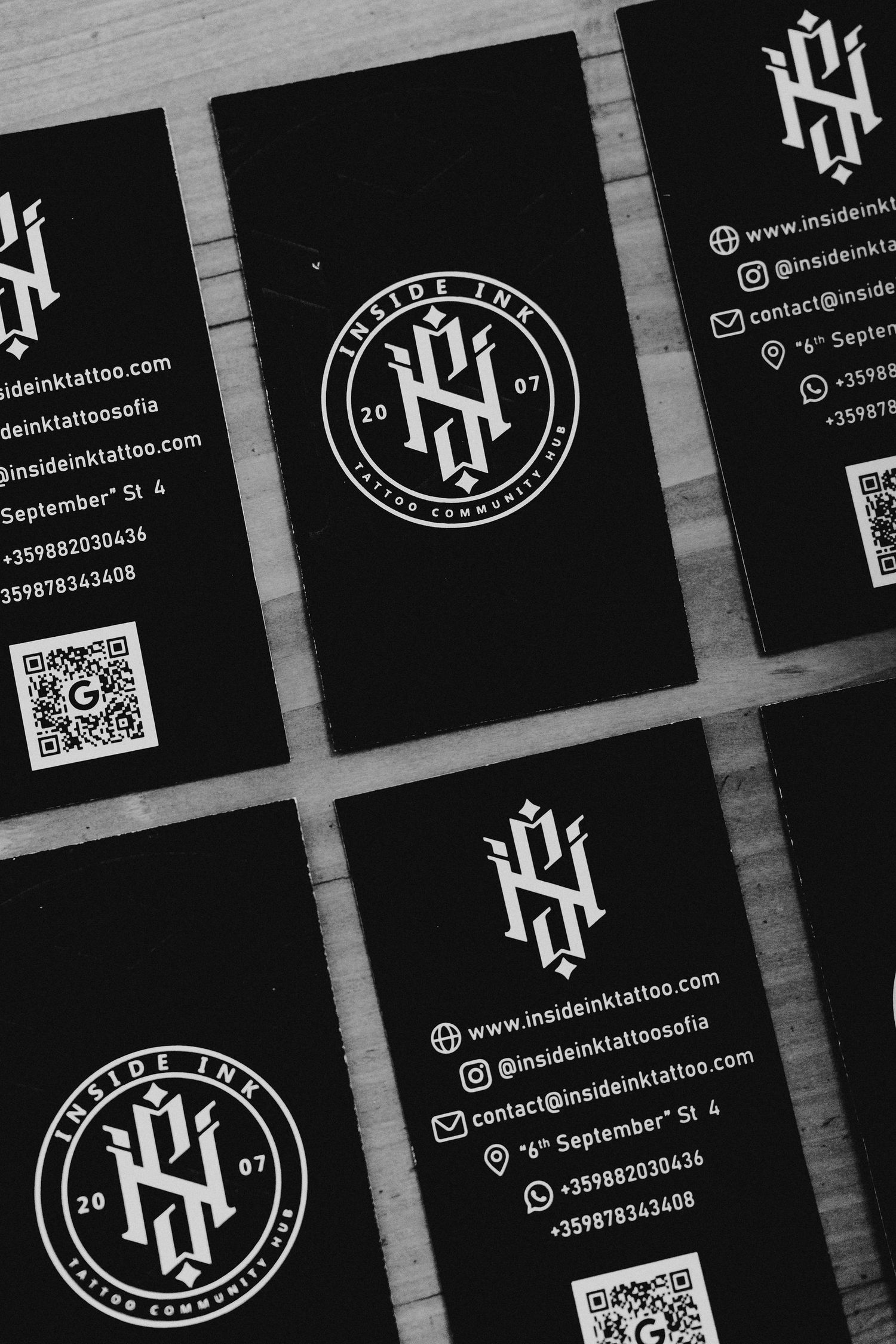 Black and white business cards for Inside Ink Tattoo Sofia featuring logo, QR code, and contact details.