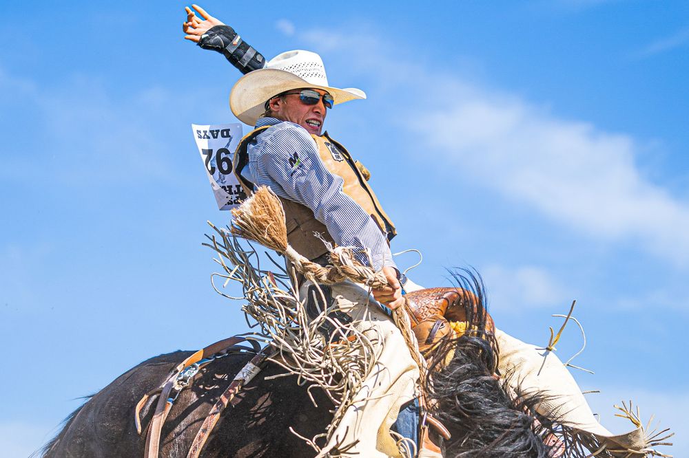 Saddle Bronc rider at an amateur rodeo