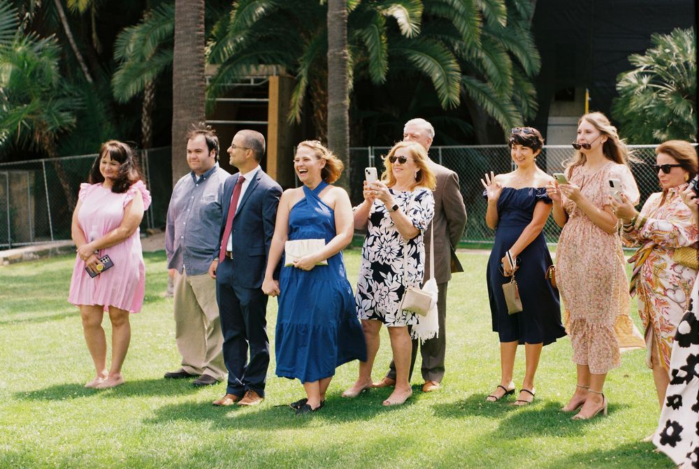 Wedding guests watch a gay couple elope at Santa Barbara Courthouse