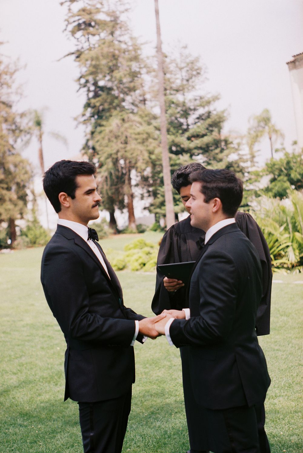 Cinematic 35mm film wedding photography of an LGBT elopement at the historic Santa Barbara Courthouse.