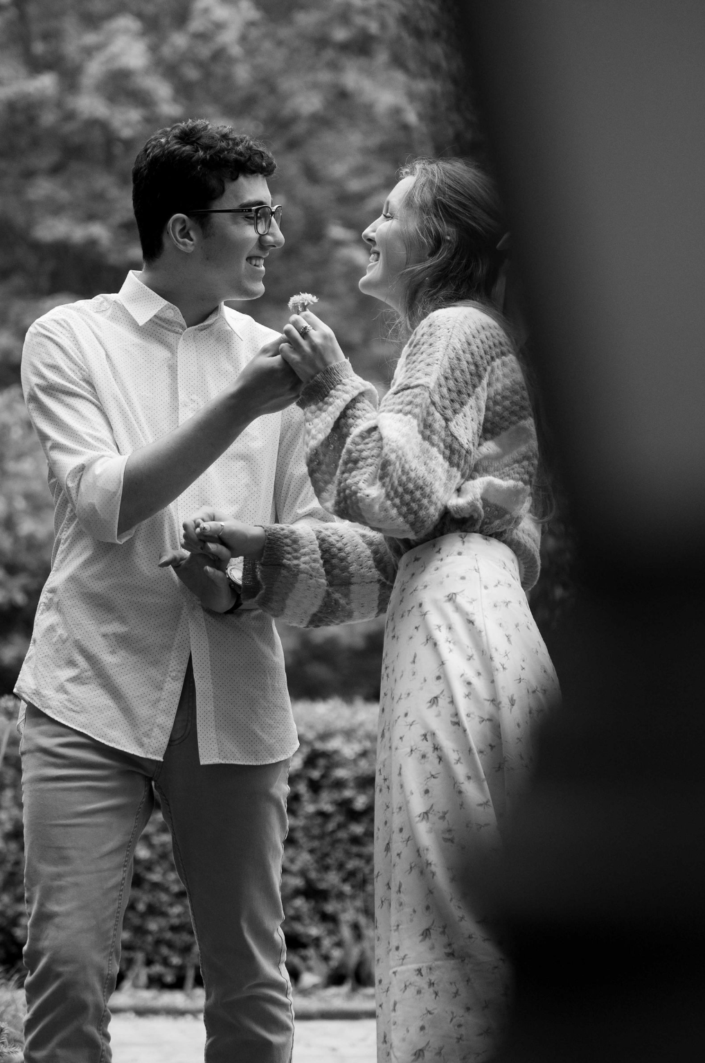 Engagement photo session in a spring garden.