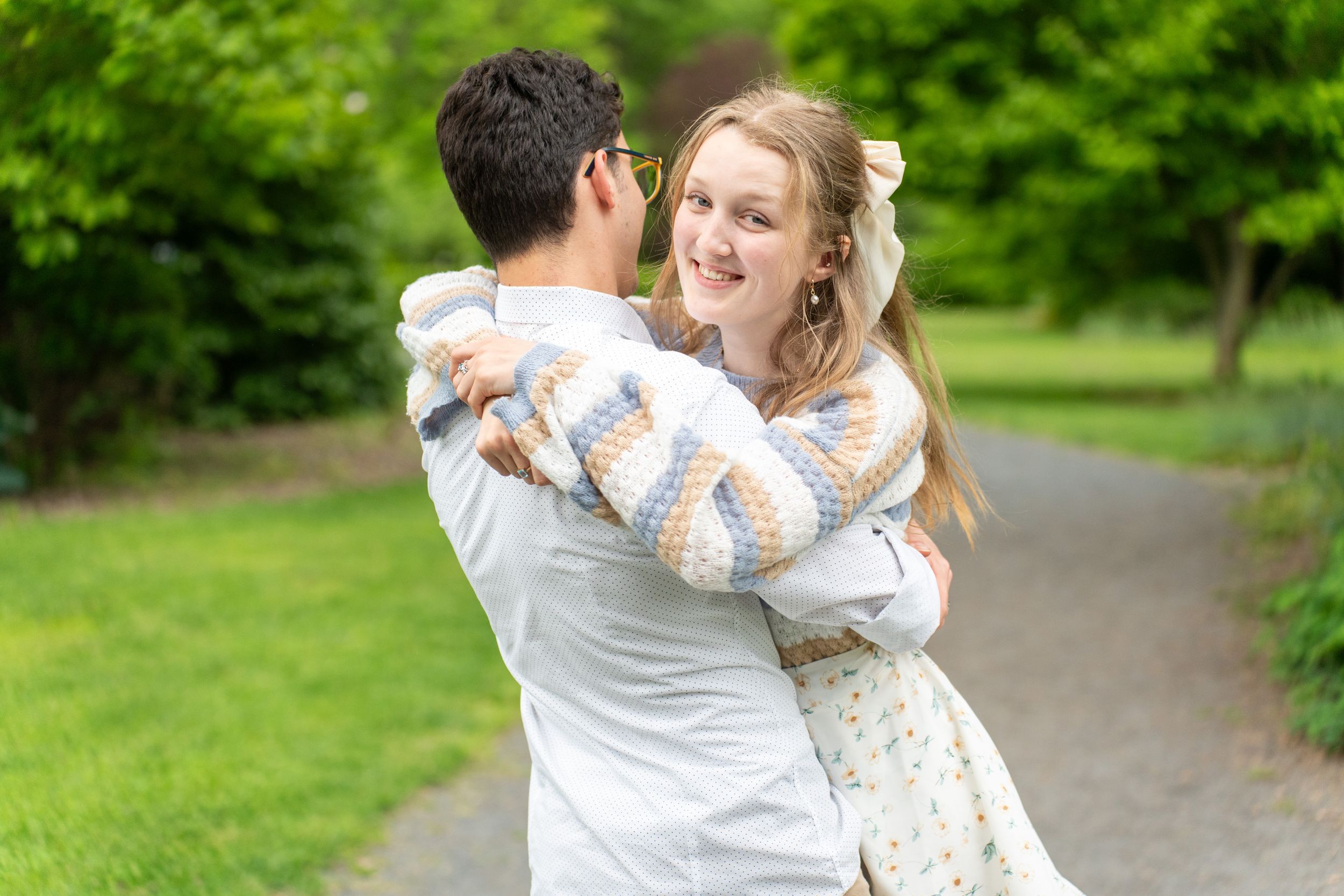 Engagement photo session in a spring garden.