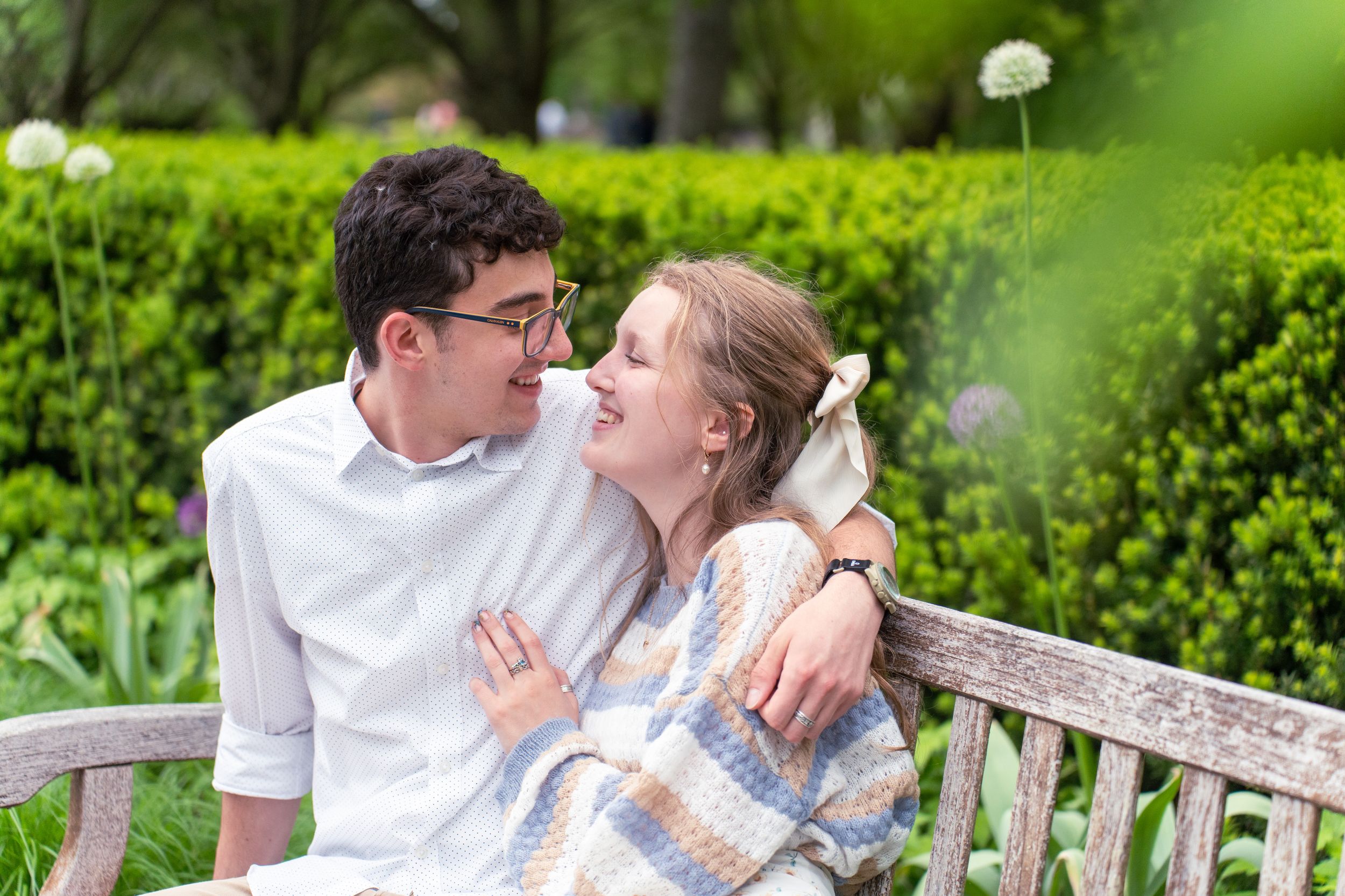 Engagement photo session in a spring garden.