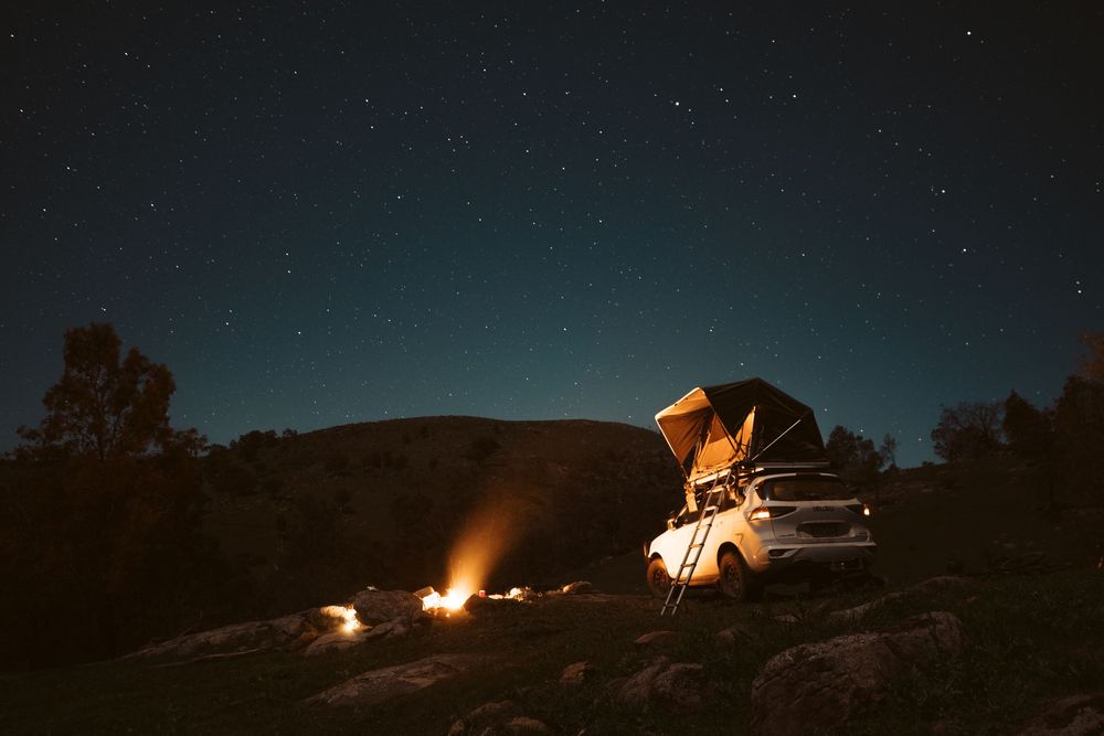 Starry night sky over remote campsite in Goulburn Region Victoria