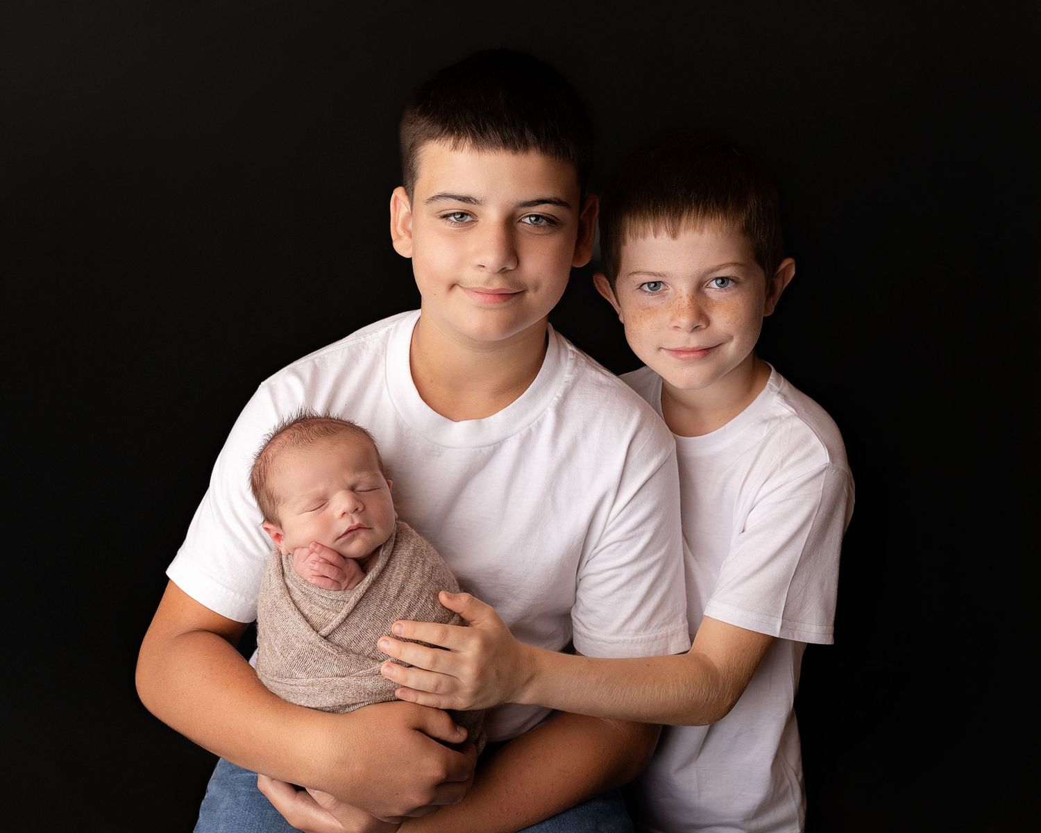 Professional photo of a family with their newborn baby