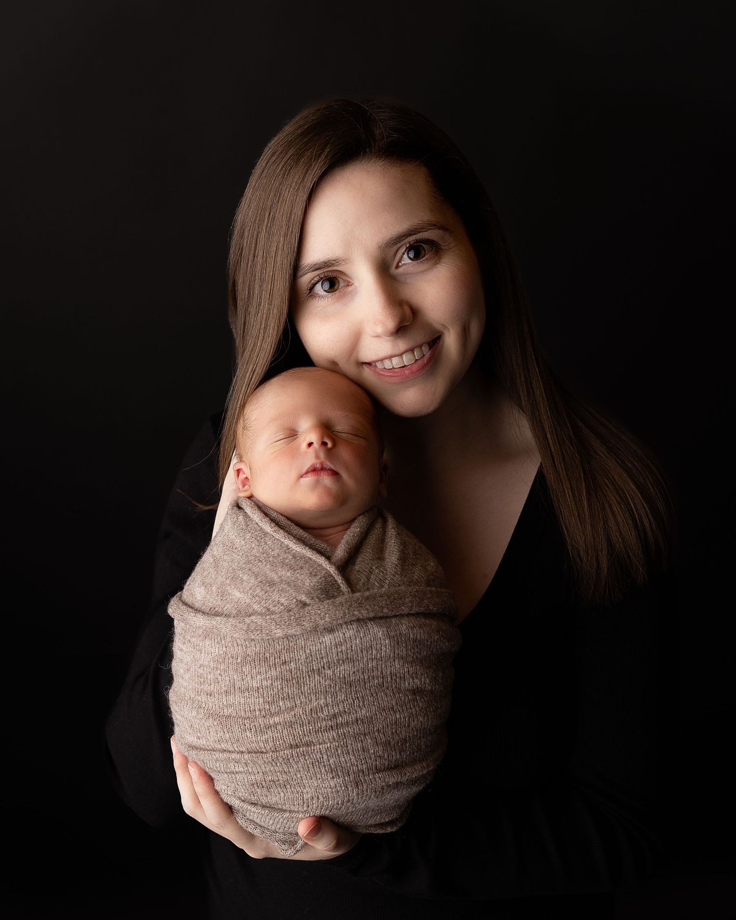 Professional photo of a family with their newborn baby