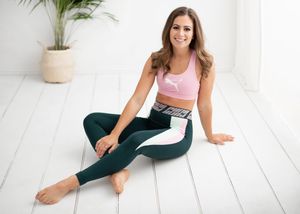 Person in athletic wear practicing yoga poses on a white wooden floor with a plant in the background.