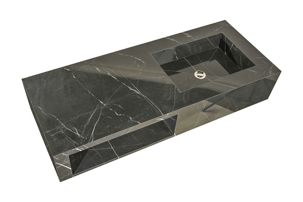 Black marble rectangular vessel sink with integrated basin and polished surface, ideal for modern bathroom design.