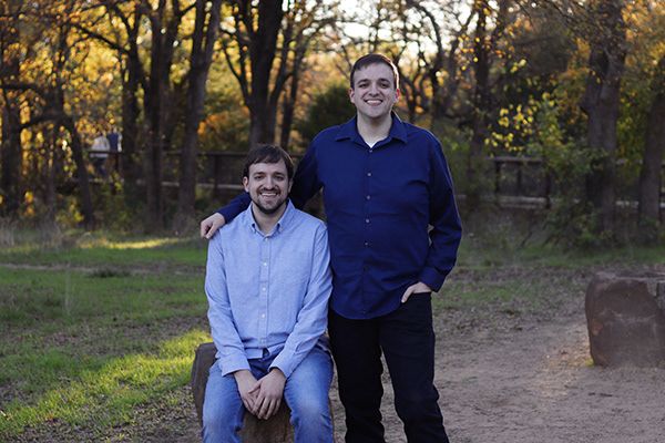 Brother portraits wearing blue.