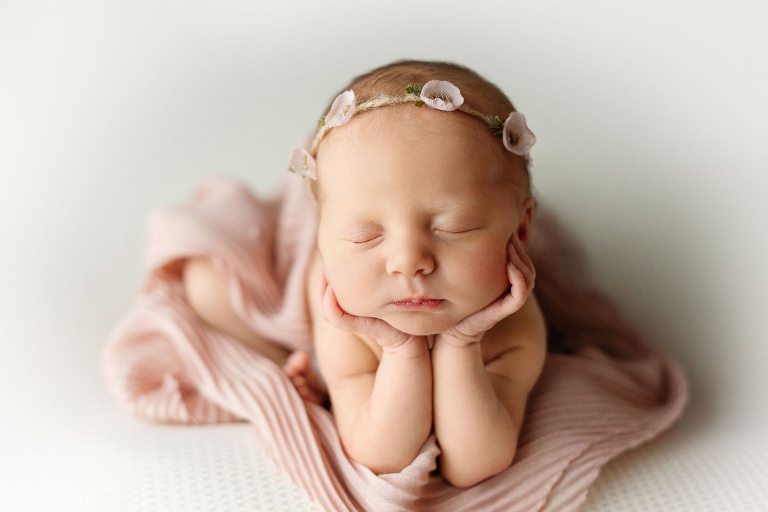 A baby girl newborn doing the froggie pose. Greenville SC newborn photographer, Easley SC newborn photographer
