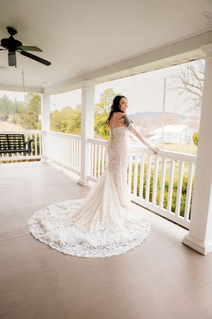 White lace wedding dress with long train photographed in sequence across a bright outdoor porch.