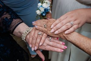 Close-up shots of hands showing wedding rings and bridal jewelry details.
