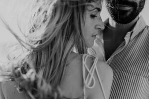 Emotional sea-side moment during intimate elopement in Portugal