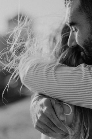 Bride’s hands on groom’s chest — intimate storytelling by elopement photographer