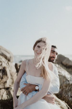 Emotional connection at a symbolic ceremony by the sea