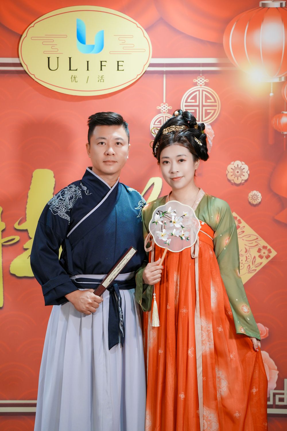 Joyful corporate event photography featuring a group in traditional Hanfu at a company party, by an Auckland event photographer.