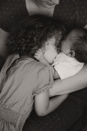 Black and white series showing a sleeping child in peaceful repose.