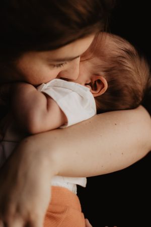 Intimate close-up series showing tender moments in soft, natural light.