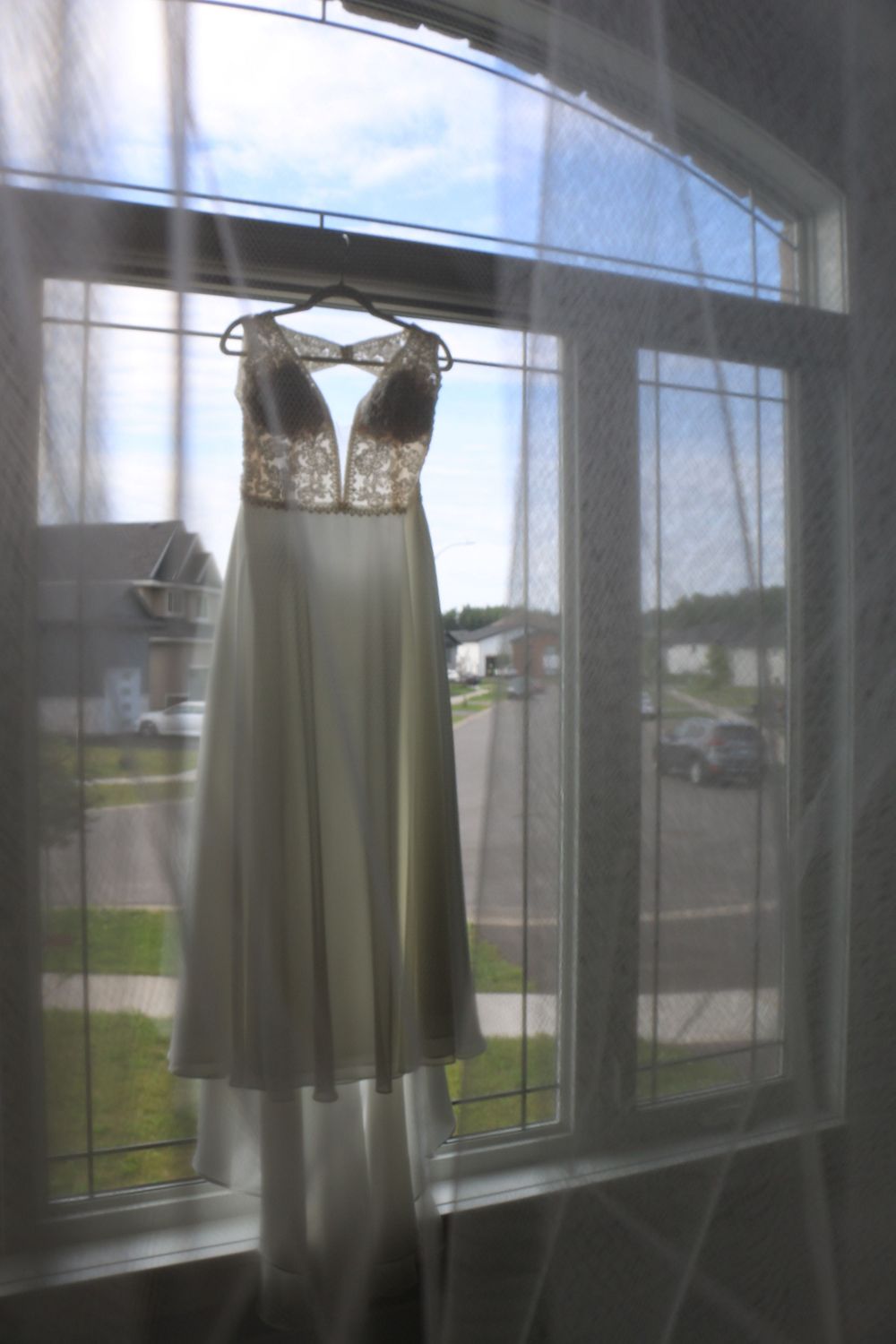 The dress photo. I'm all about it, this one is my favorite! Weddings are long, so much goes into them, I love catching every detail!