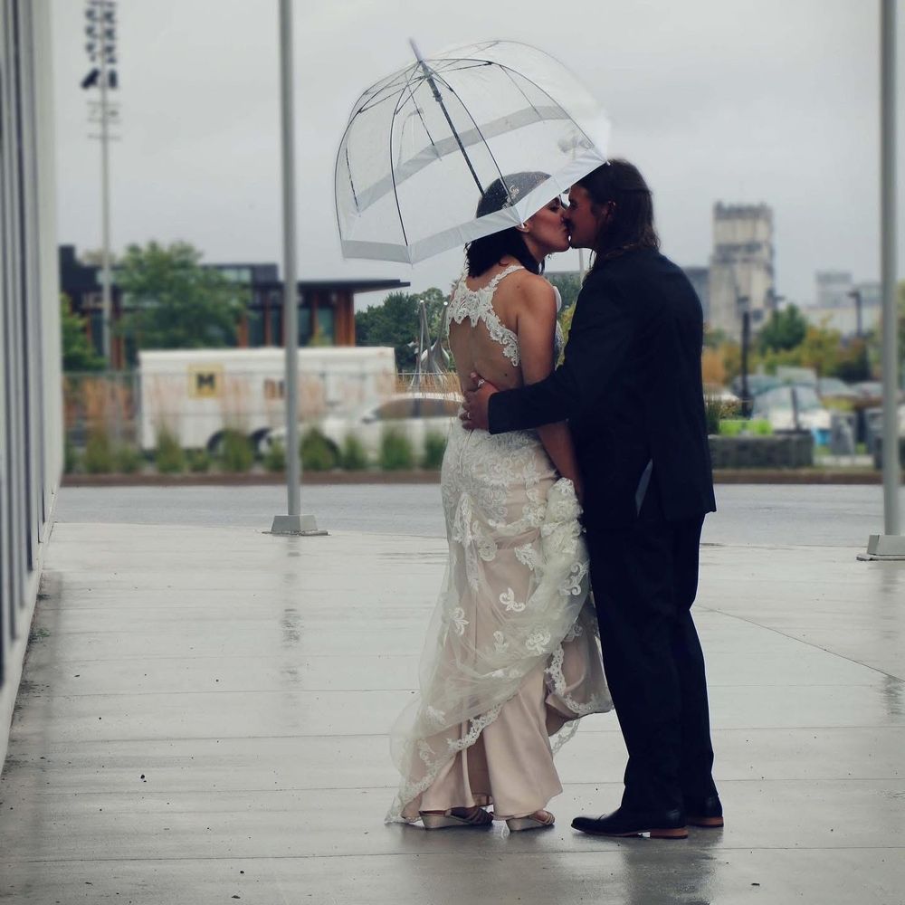 Rainy wedding days make for amazing, romantic photos.