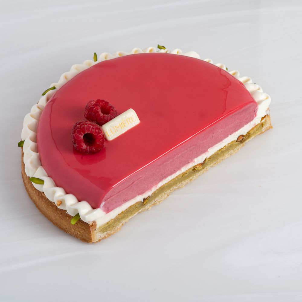 Assorted pastries and desserts photographed for Lumière Patisserie, captured in a professional food photography setup.