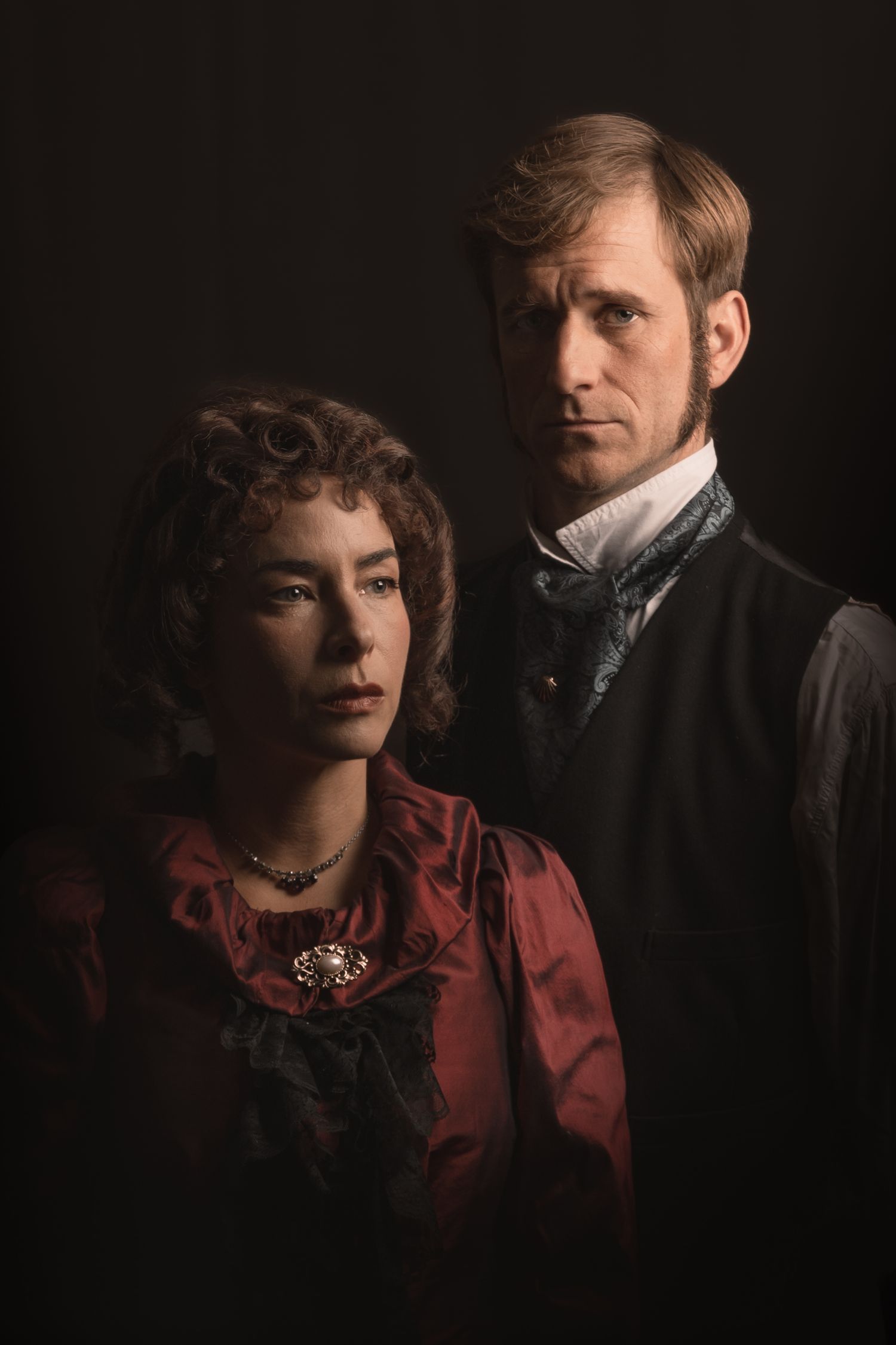 theatre photography promo photograph of two actors side lit in victorian costume for the play great expectations