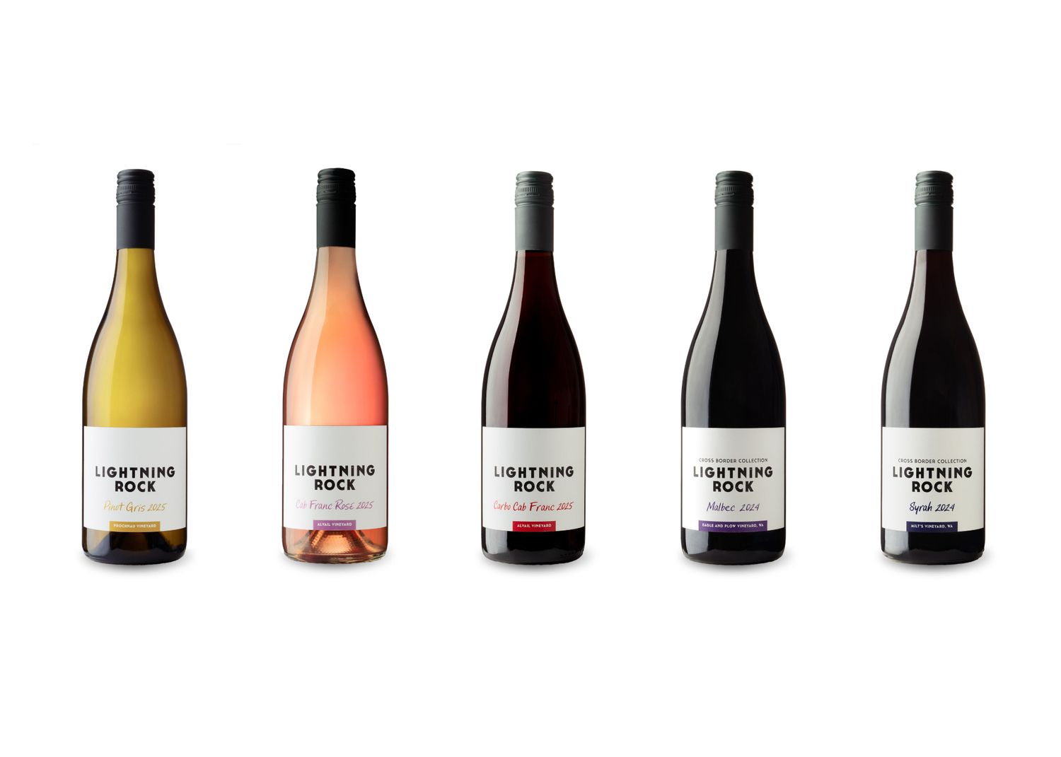 Line-up of five Tightrope Winery magnum wine bottles - studio product photography by Okanagan photographer Tania Veitch.