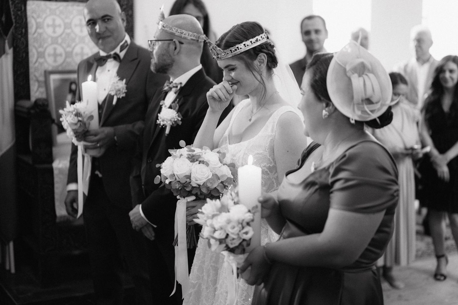 A collage of black and white wedding celebration photos showing couples dancing and embracing at their reception.