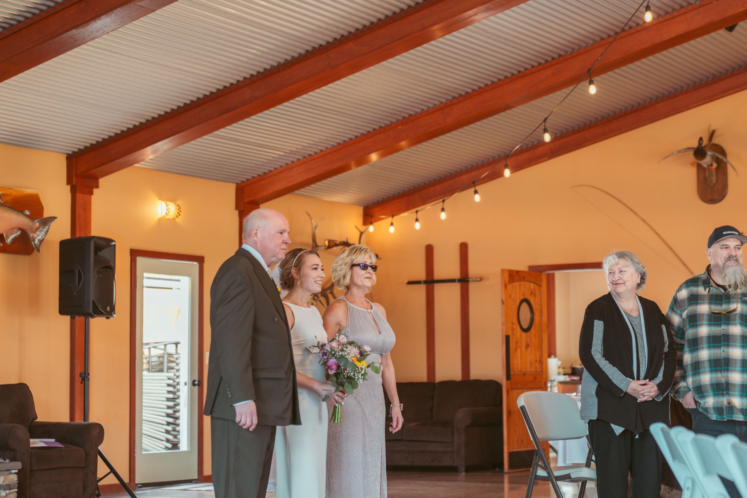 A series of multiple indoor wedding ceremony moments captured side by side showing a reception celebration.