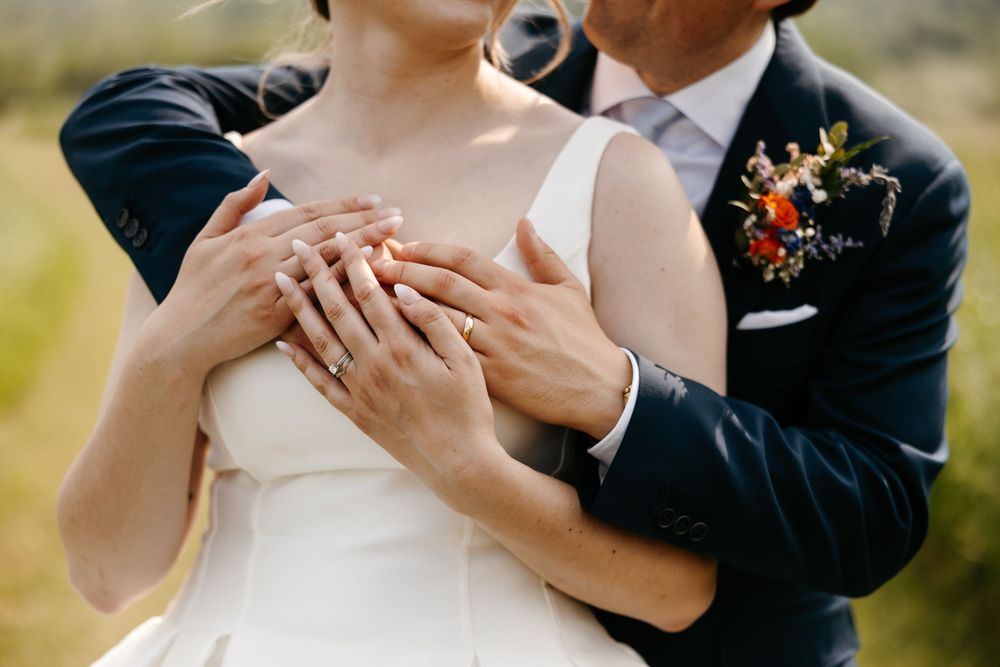 Romantic close-up of couple embracing during wedding ceremony captured in five connected photos.