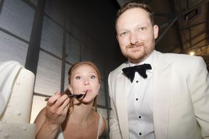 Close up portrait shots of a formal couple in wedding attire laughing and sharing intimate moments.