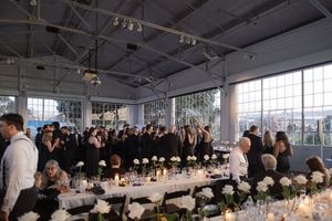 Wedding reception with white floral centerpieces for an elegant event celebration. Gallery 308 San Francisco Wedding Photographer