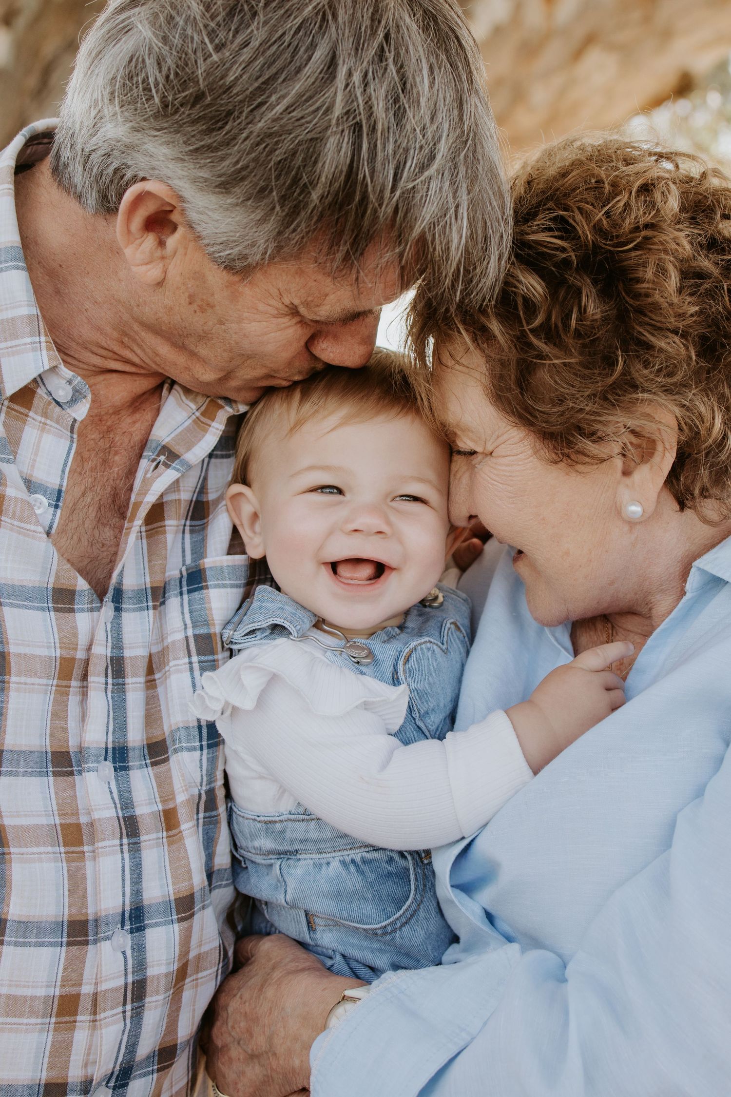 Multi-generational family photo capturing love across generations.