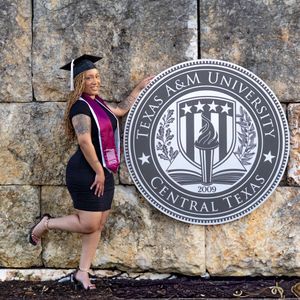 Graduate poses in front of stone wall with university seal medallion in multiple artistic graduation photos.