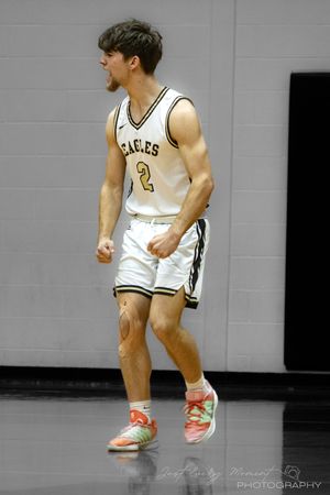 Basketball player in white jersey jumps and moves dynamically across multiple action shots on the court.