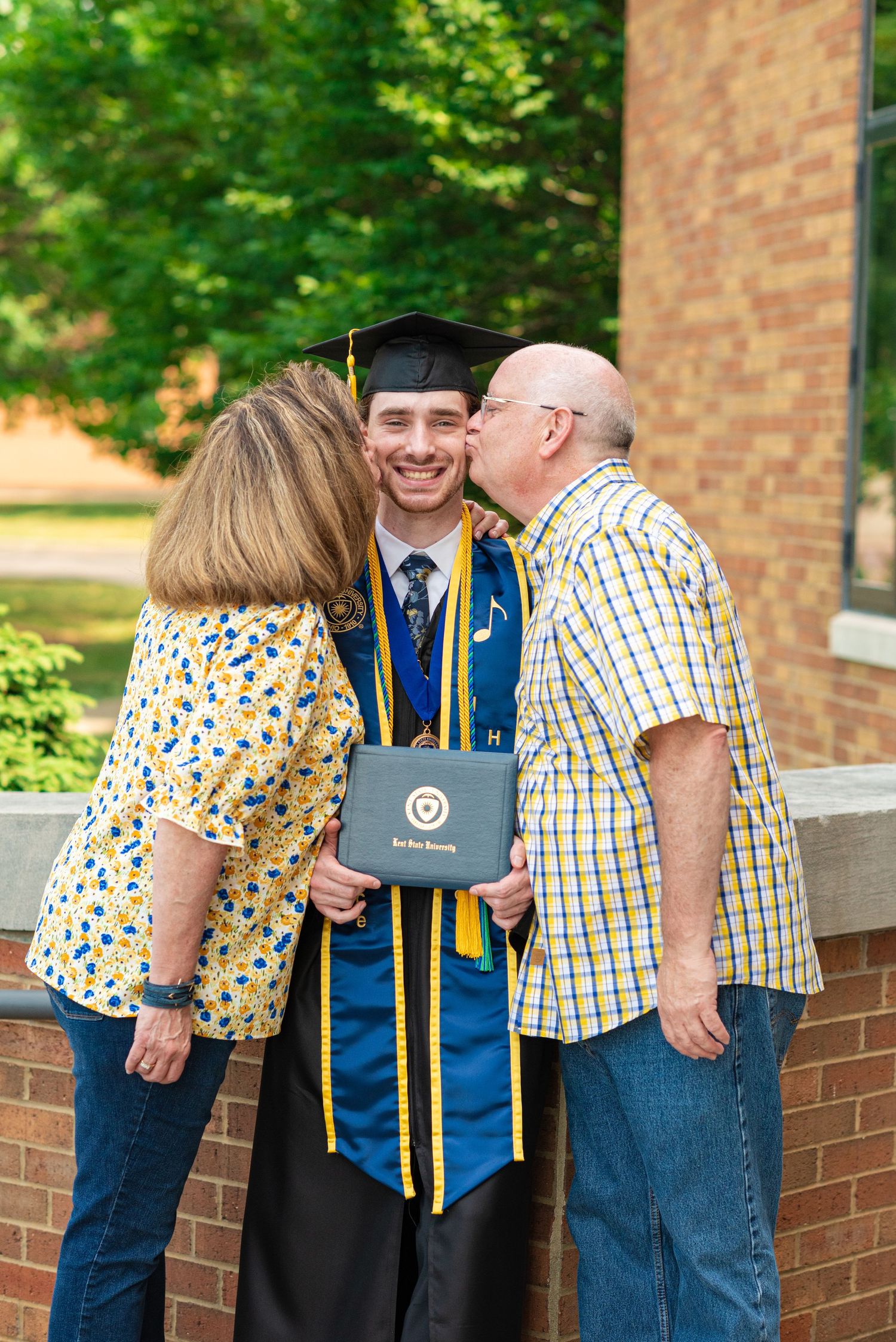 College graduation photos with family at Kent State University in Kent, Ohio