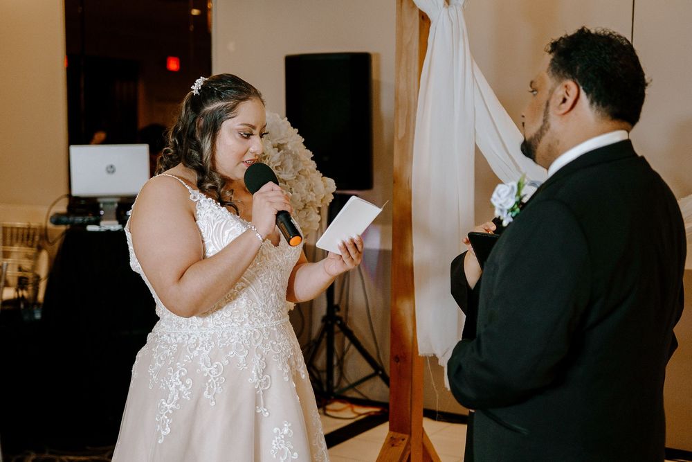 A wedding ceremony sequence showing the couple exchanging rings and their first kiss at the altar.
